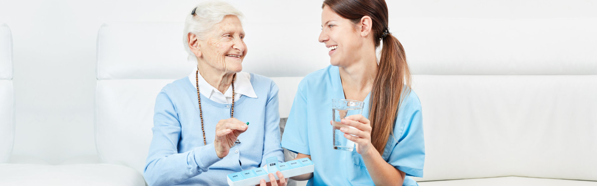 Caregiver giving medicine